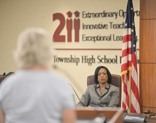 Several community members, and even a couple politicians, spoke during a raucous Palatine-Schaumburg High School District 211 board meeting Wednesday about the alleged acceptance of a transgender stud...