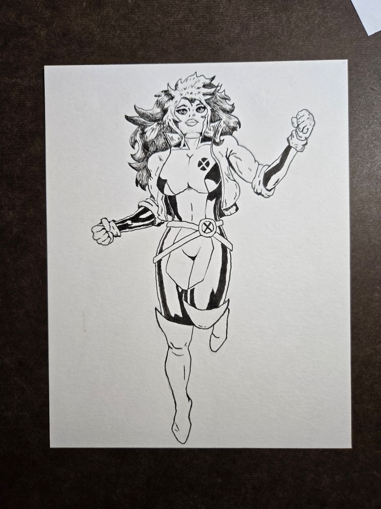 Black and white ink rendering of Rogue from the x men. 