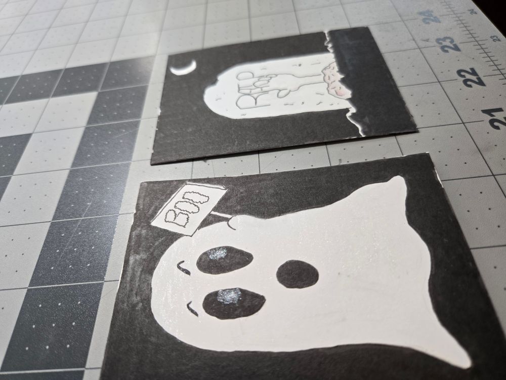 Alternate angle of cards to show metallic highlights in ghosts eyes. 