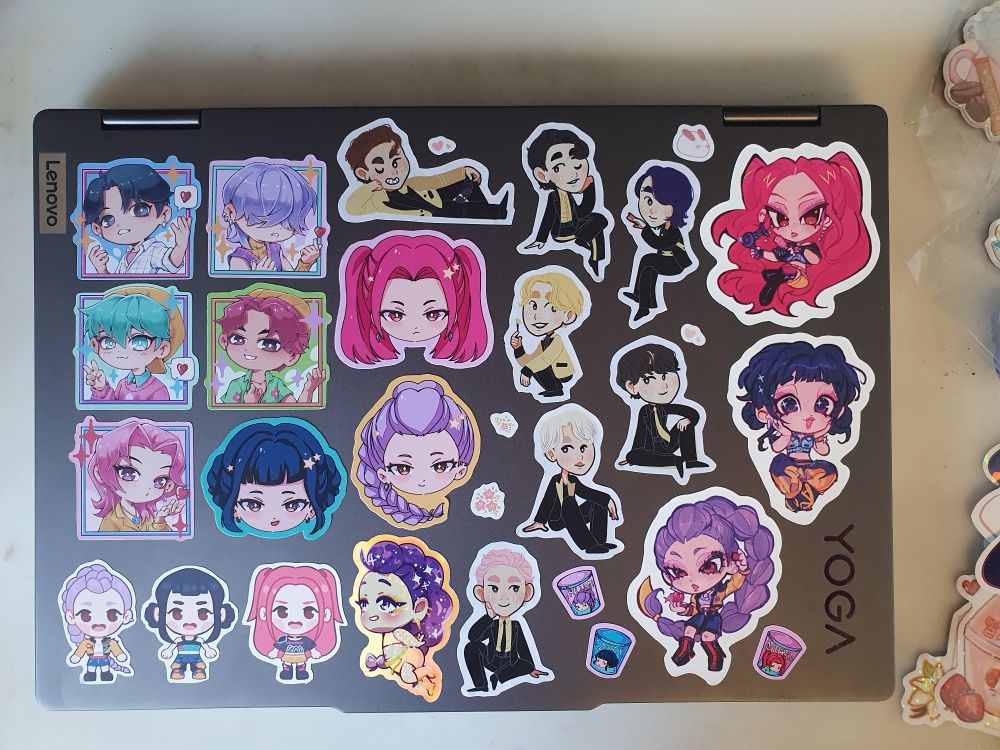 My new laptop with a bunch of Huntrix, Saja Boys and BTS stickers