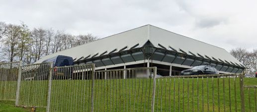 Olivetti Building (former), Harrison Road, Dundee, off the Kingsway. From Google Streetview. Built 1972. Triangular prows project the building forward over supporting pillars (piloti). Roof now grey instead of original golden yellow.