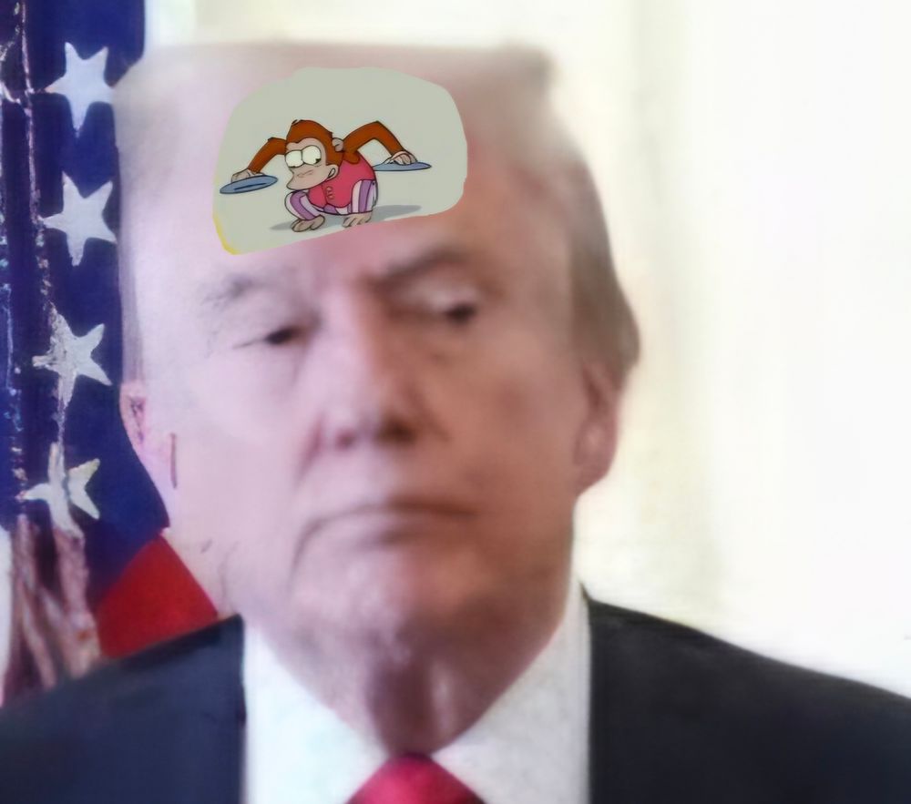 Close up of Trump's face showing Homer Simpson style monkey-with-a-cymbal thought bubble.