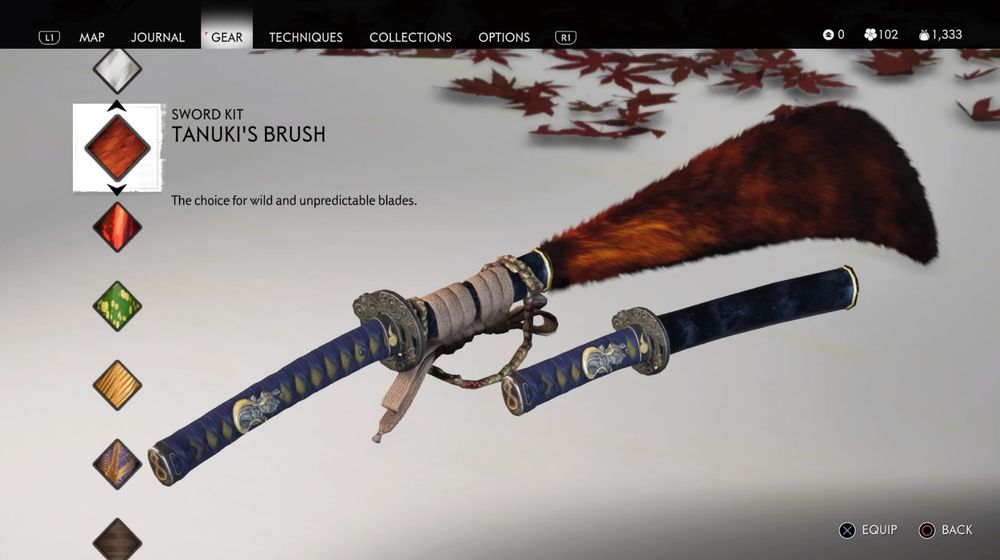 A screenshot from the game Ghost of Tsushima. It's the sword kit Tanuki's brush. A deep, dark blue, sprinkled with lighter blue and a beige binding. 
The sword sheath is wrapped in dark red fur.