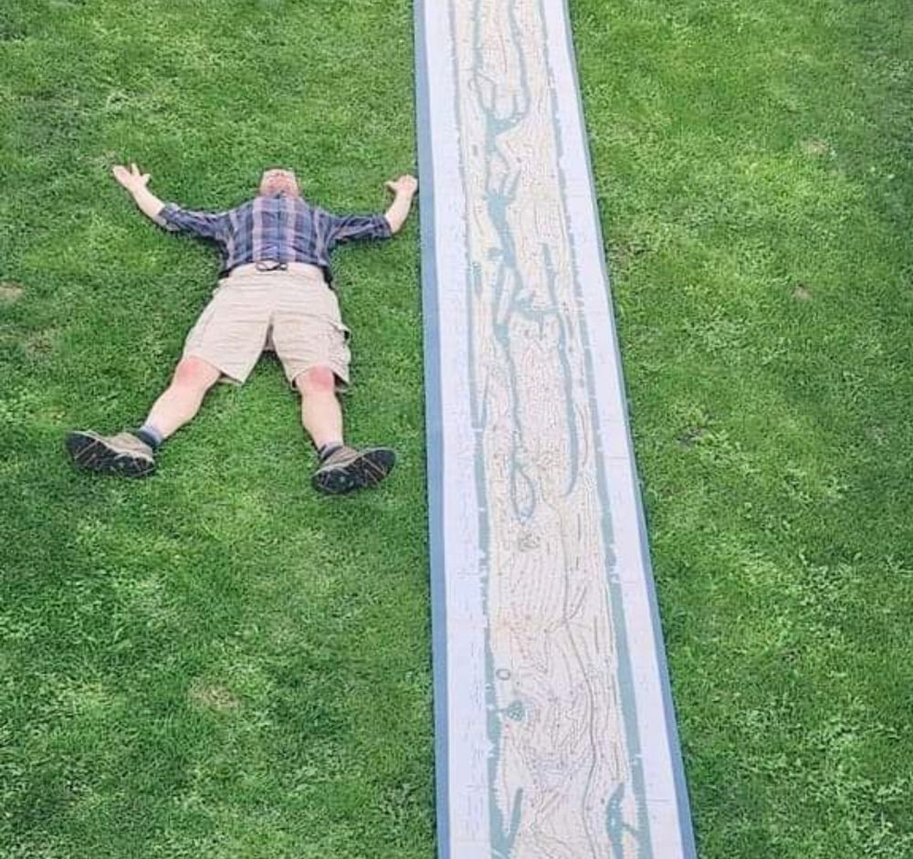 Paul. Led down next to a 1:1 scale Peutinger Table, map.... 