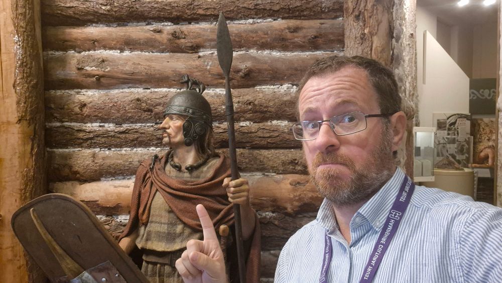 Me, next to Cedric at the Iron Age Musuem. An Iron Age life size model with a solar and shield at hand. 