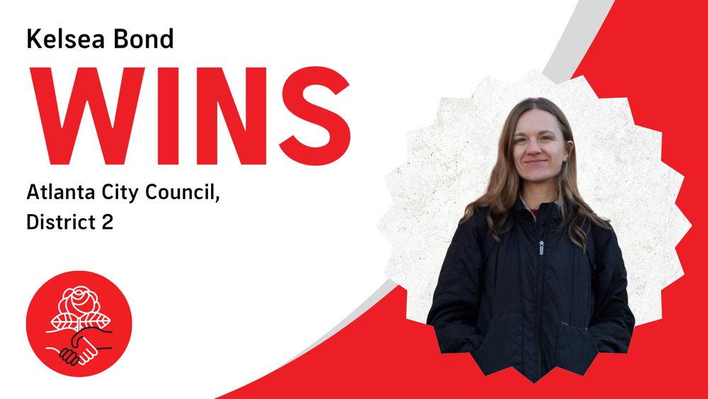 DSA endorsed Kelsea Bond wins 2025 Atlanta City Council seat! Photo of Bond outside wearing a jacket in a relaxed position with hands in pockets.