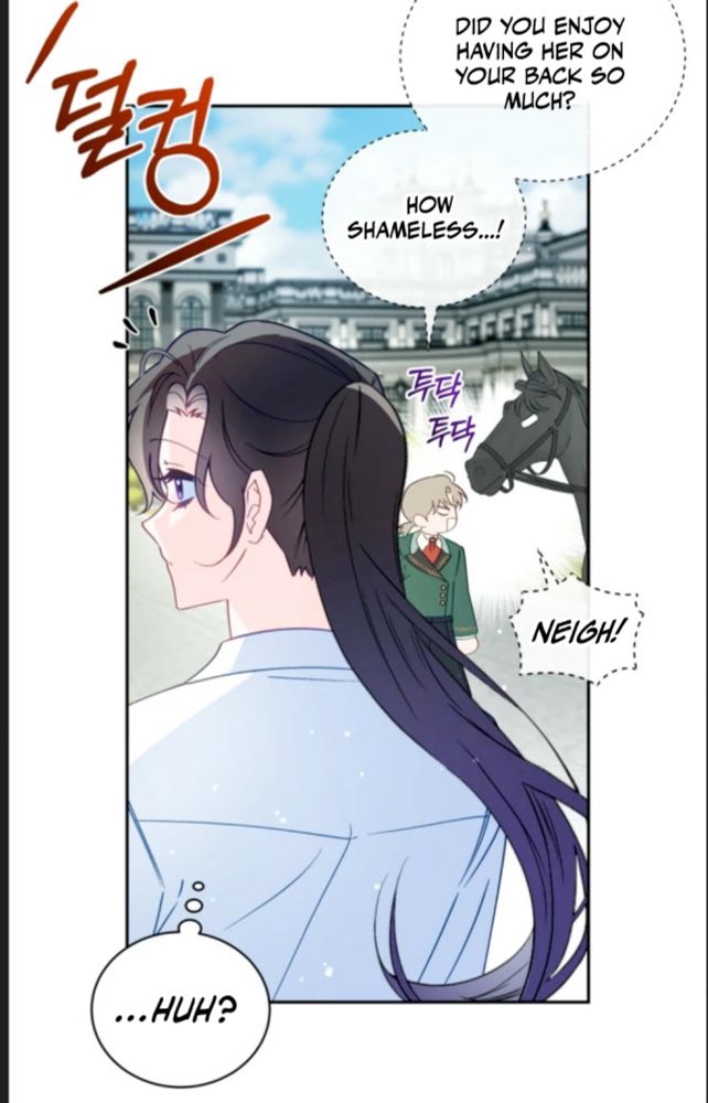 A woman with long dark hair looks left. In the background a man whispers to a horse "Did you enjoy having her on your back so much? How shameless!!"