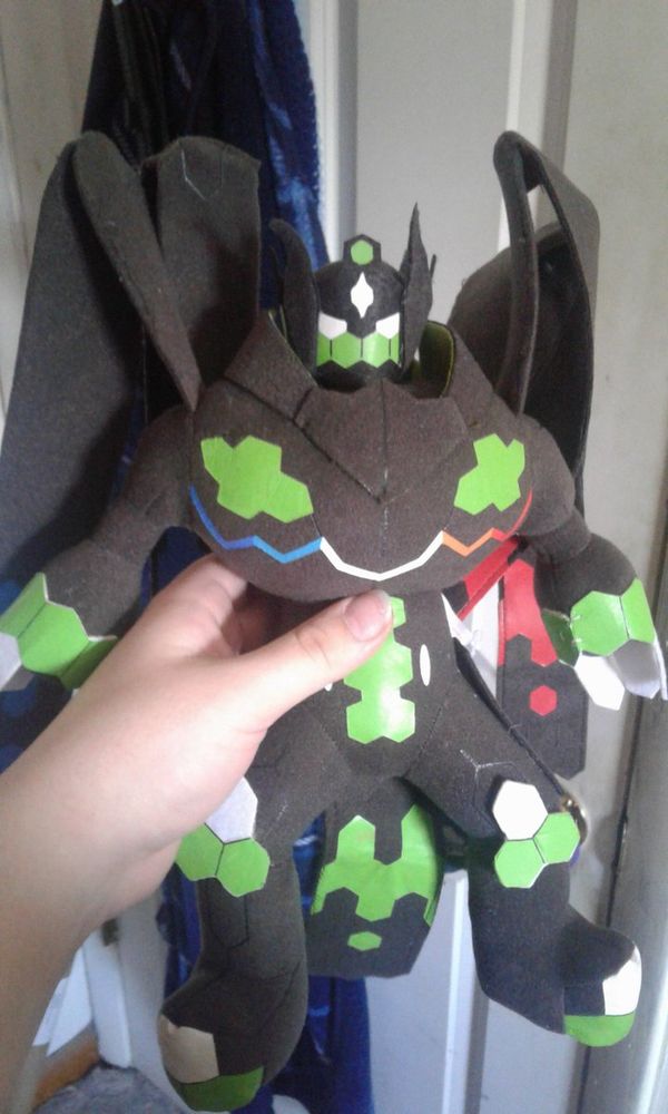 My Zygarde Complete Form plushie!  I was so lucky to find this at a reasonable price on ebay.  One of my most prized possessions <3