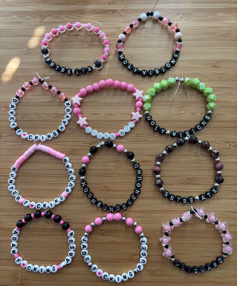 AFI friendship bracelets referencing Silver Bleeds the Black Sun and the band members. 