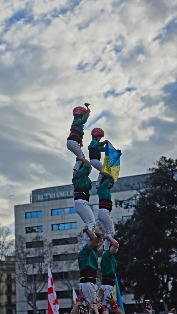 A human castell performance in Barcelona during the demonstration marking the third anniversary of Russia's invasion of Ukraine.