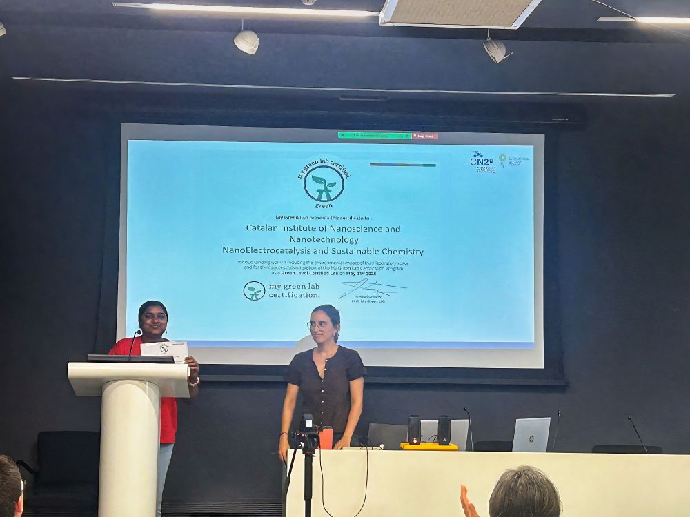 A NanoESC group member receiving the certificate on team's behalf.