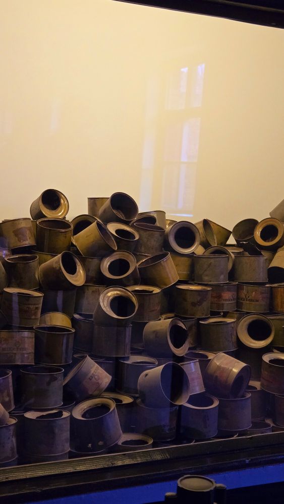 Pile of cans of Zyklon B used in gas chambers during holocaust 