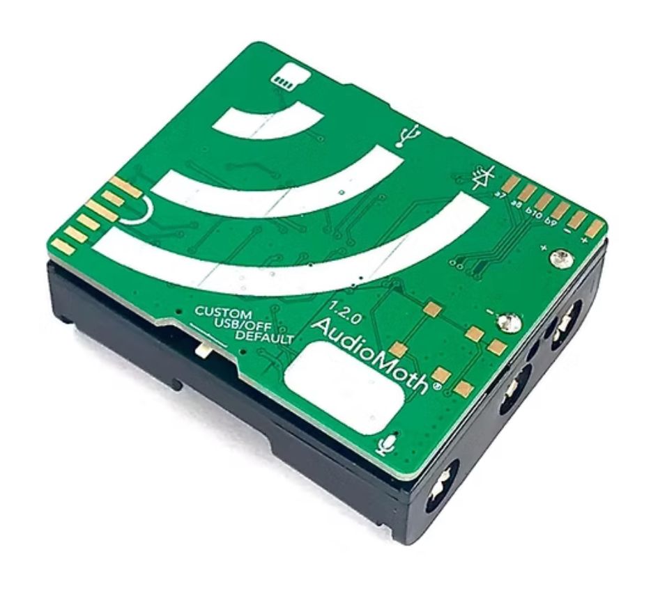 Photograph of an AudioMoth 1.2.0 acoustic recorder against a white background.