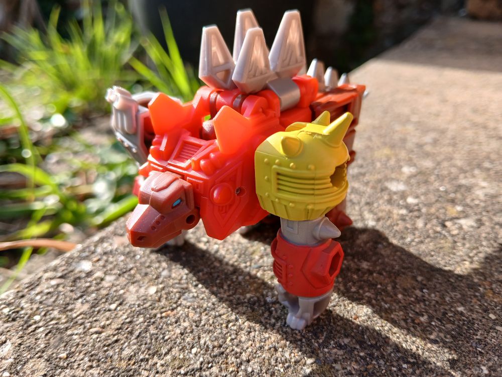 Transformers Cyberworld Dinobot Snarl is a scrapheap in the shape of a stegosaurus that's been lifting 