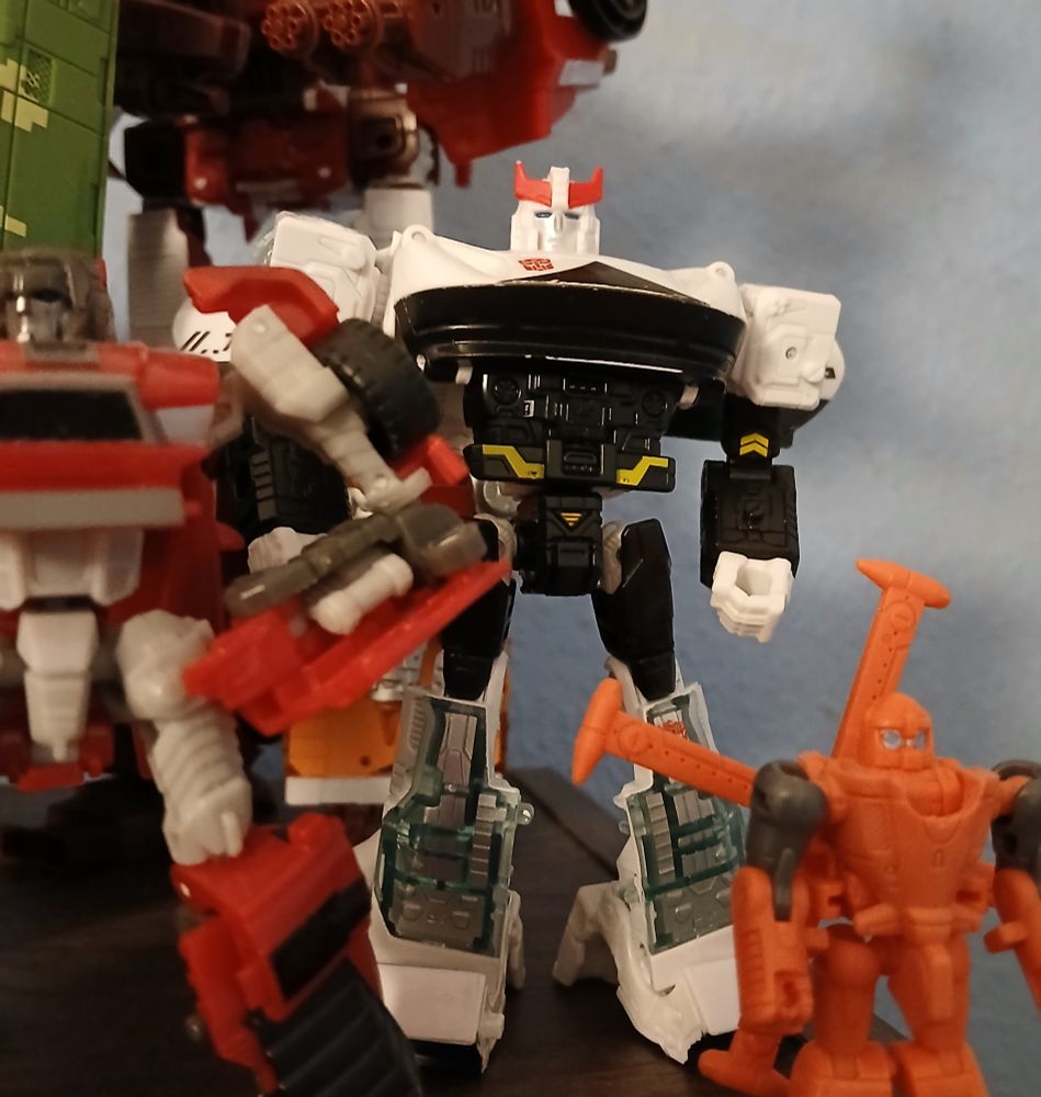 Transformers Siege Prowl the spacey police car man looking like he's made out of a Sinclair C5 and a Blade Runner car. 