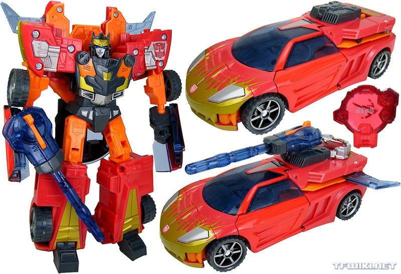 Cybertron Excellion gets less orange on his chest and swaps the orange on the car for gold flames.
