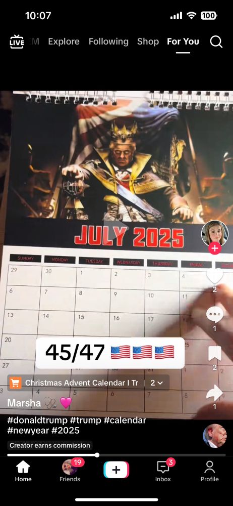 Image depicting July 2025 on a Trump calendar with Trump’s face photoshopped over George Washington’s depiction as a tyrannical king in the Assassin’s Creed III DLC.