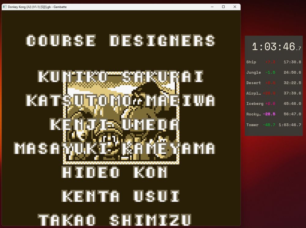 A screenshot of my speedrunning setup. An emulator window of Donkey Kong 94 for the Gameboy is showing the credits rolling, and the timer window shows a final time of 1 hour, 3 minutes, 46.7 seconds. This time is 45.7 seconds faster than my previous personal best time.