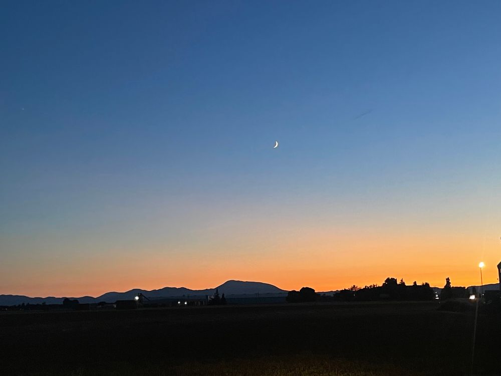 Sunset! Sliver moon visible.