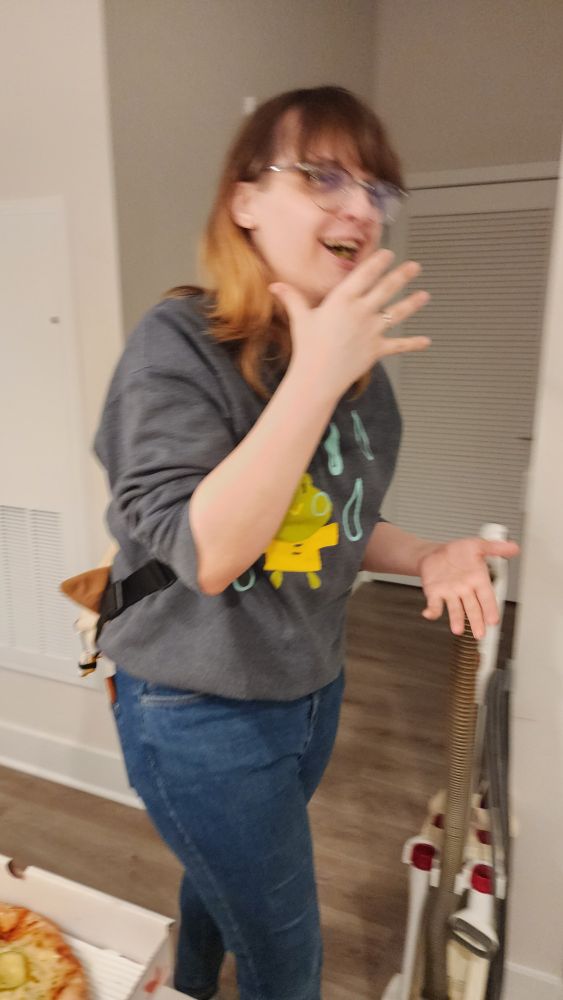 Blurry woman looking upset walking away with mouthful of pickle pizza