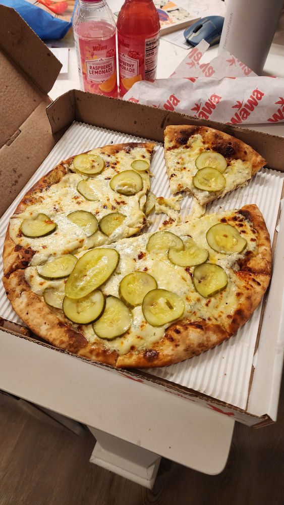 Pickle pizza with dill pickle ranch sauce. Yucky