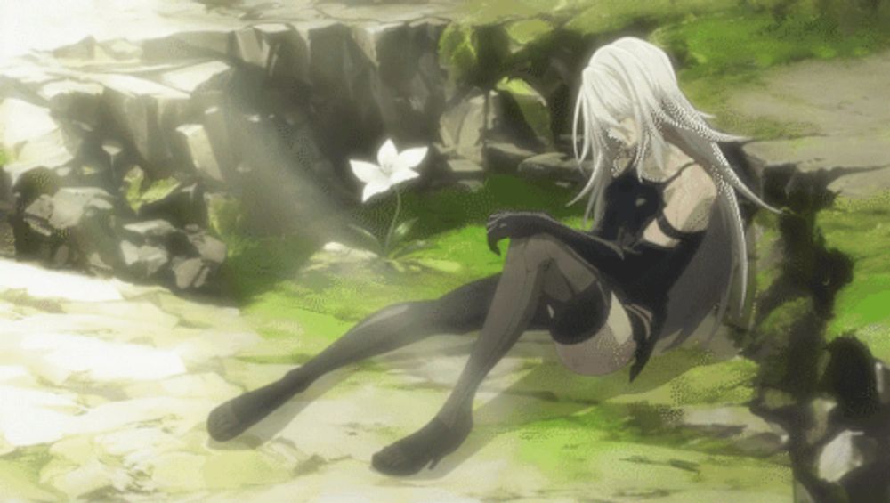 a woman with long white hair is sitting on the ground next to a white flower