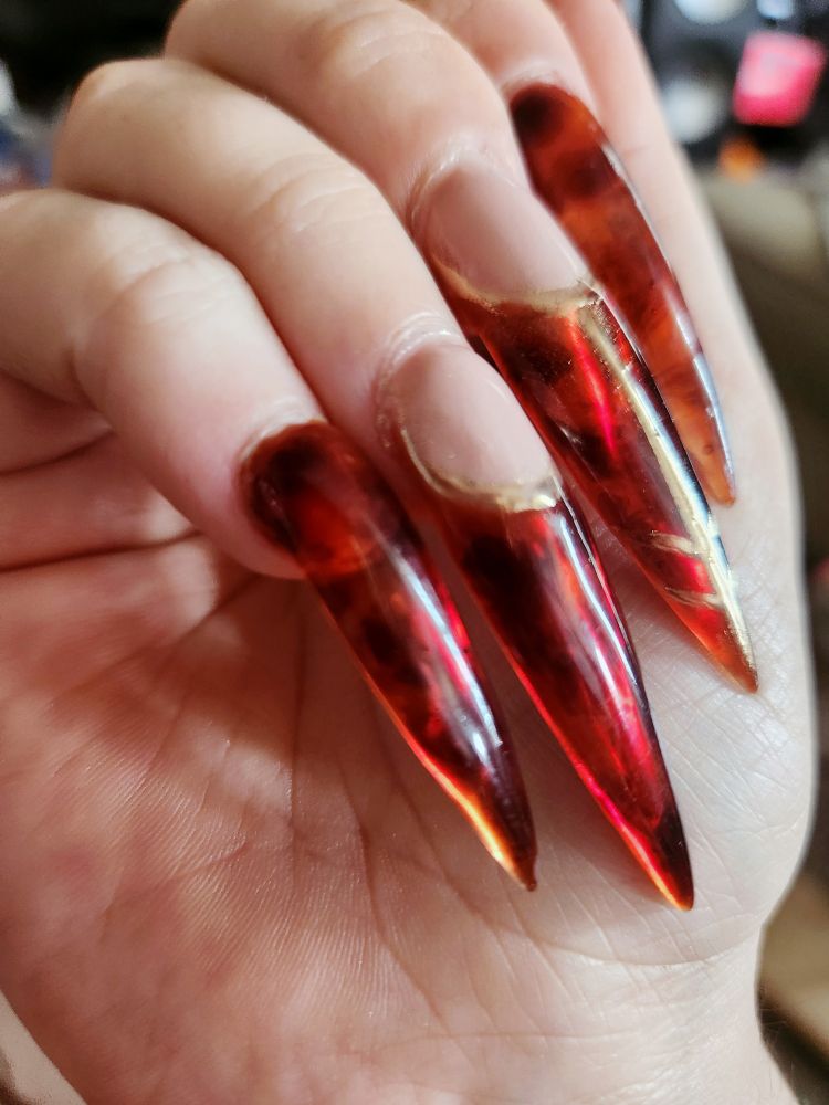 Domina Jemmas semi transparent tortoiseshell nails