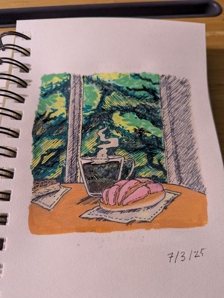 A concha, a Mexican sweet bread with pink craquelin made from butter, sugar, and food dye sits next to a warm drink on a table next to a window with vibrant green trees, creating a small moment of peace