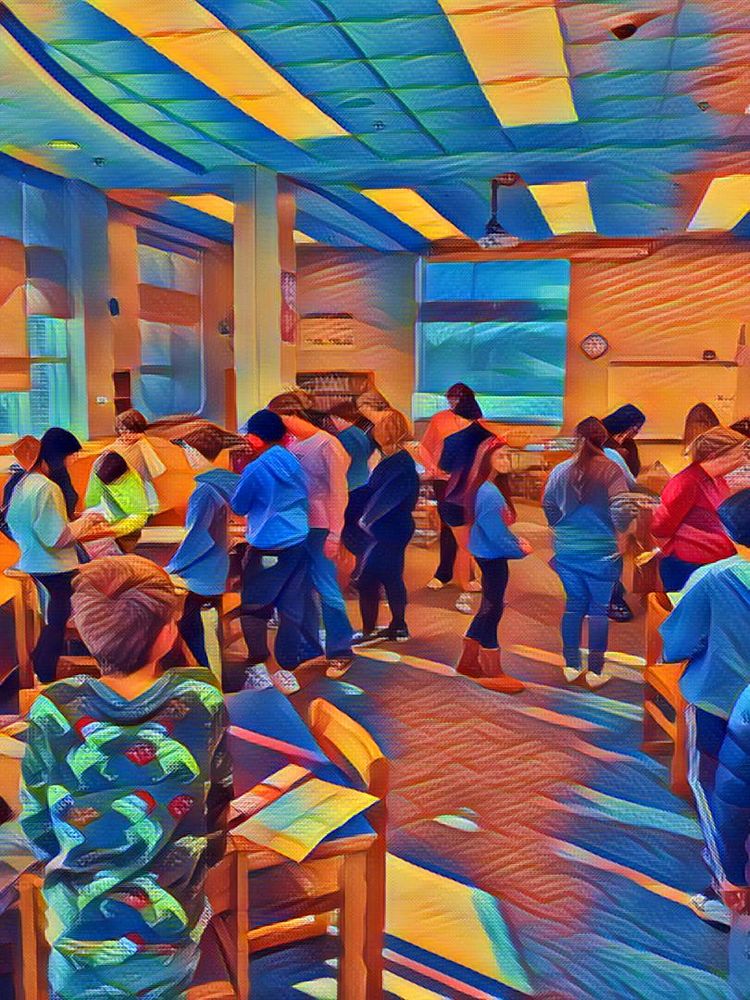 students discussing projects with each other in the library