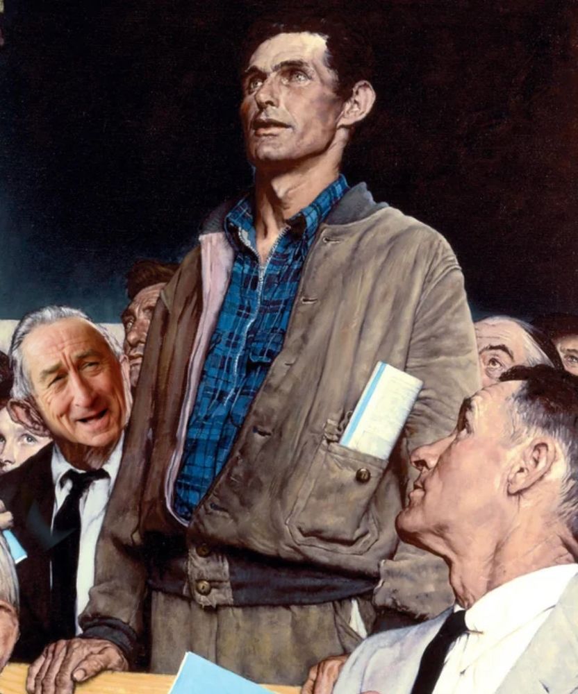 The same image of the man standing to make a statement, but the old man on the left actually has Robert DeNiro's face.