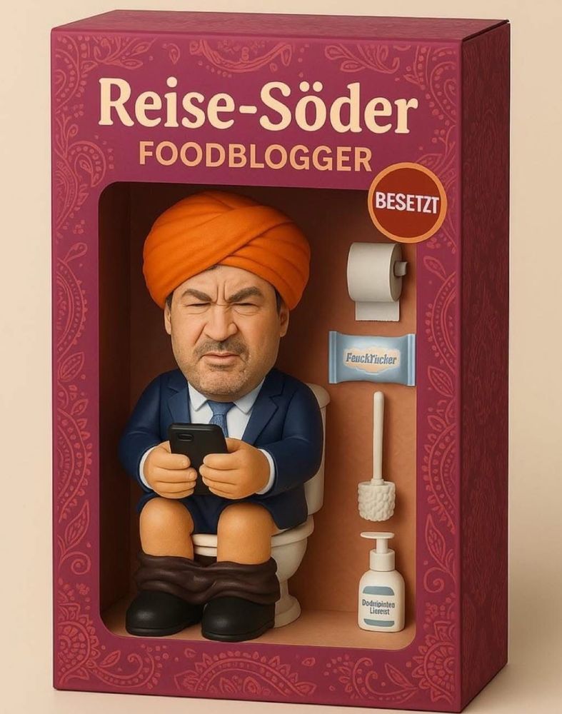 Reise-Söder der foodblogger.

Man sieht eine Actionfigur von söder auf dem Klo 