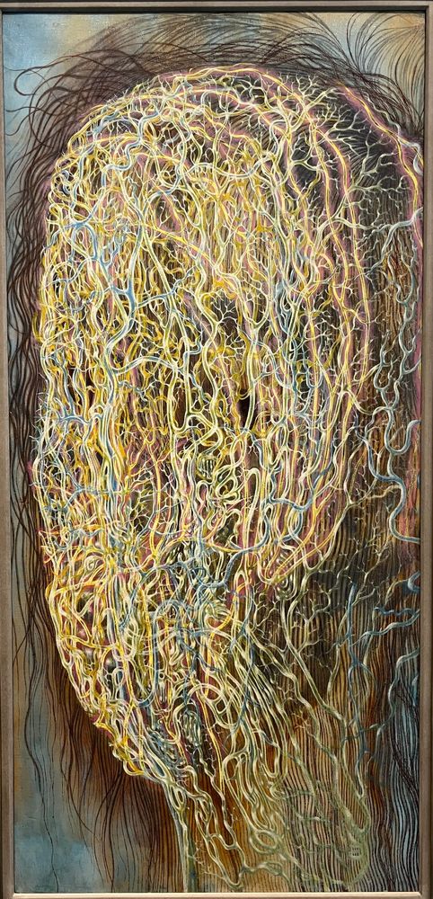 Female face composed of vessel-like network