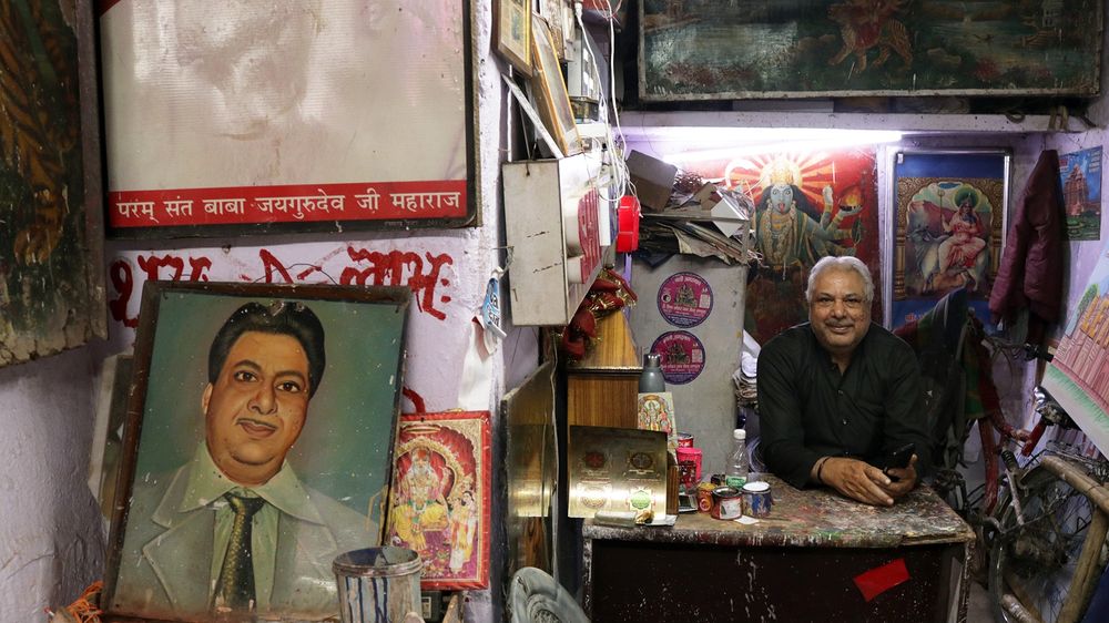 Mohanlal Sihani in his workshop with self-portrait