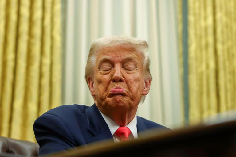 The President of the US, screwing his face up like a petulant child and sticking his pet lip out!