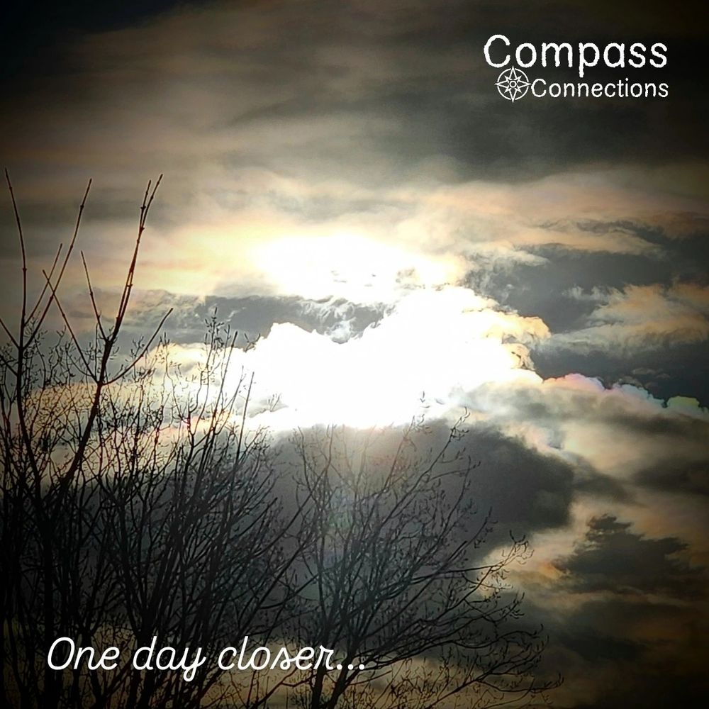 Sun through a heart shaped cloud