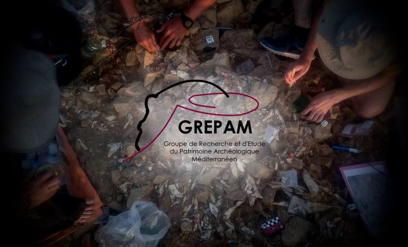 Palaeolithic excavation with the logo of the GREPAM association.