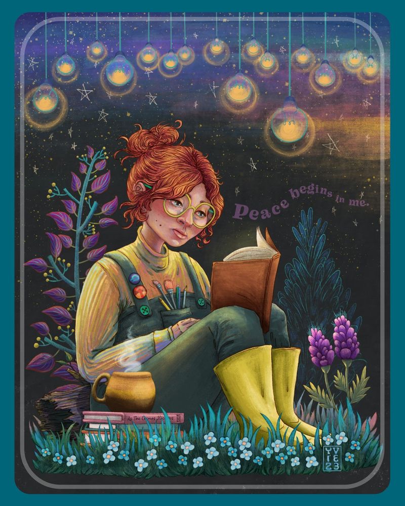 A digital illustration by Yvie Juniper-Johnson, an image with a blue border. The image is a female with long wavy hair tied back in a bun, wearing large round glasses, a roll-neck long-sleeve top under dungarees, wearing wellies. In the front pouch of her dungarees are a selection of pens, pencils and paintbrushes. Two pin badges on her dungaree straps, one is the Libra icon and one is of the letter Y. She is sat on the grass leaning against a log, knees up and resting a book on her knees. A tear is rolling down her right cheek. A mug of hot drink is steaming next to her, the mug is sat on a pile of books. Variety of plants around her. Background is dark, with hanging lightbulbs and stars above her. The words “Peace beings in me” is floating above the book.