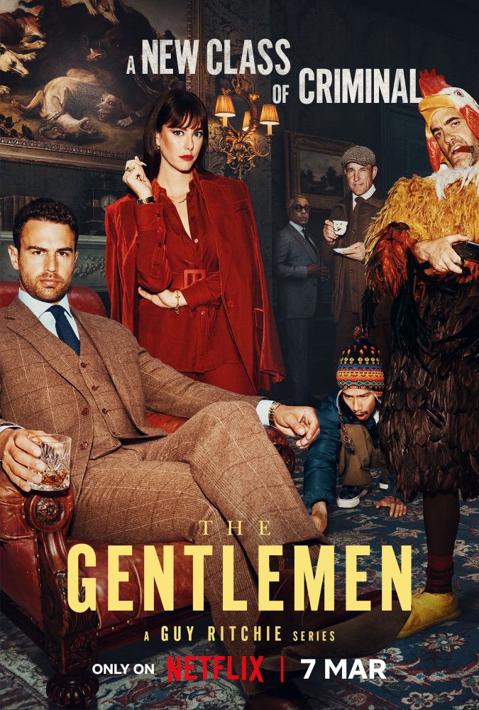 Zu sehen ist das Werbeplakat für die Netflix-Serie “The Gentlemen” von Guy Ritchie - darauf abgebildet sind mehrere der Protagonisten der Serie, einer davon trägt ein Vogel-Kostüm und hält ein Gewehr im Anschlag - eine Szene, die auch im Verlauf der Handlung eine Rolle spielt.