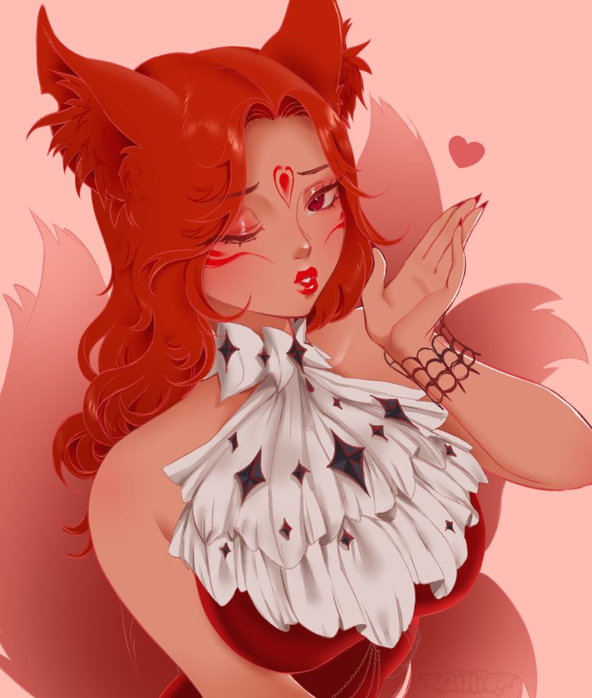 Drawing of a kitsune (fox) lady with tanned skin and firey red hair and tails.  She is blowing a kiss to the viewer.
