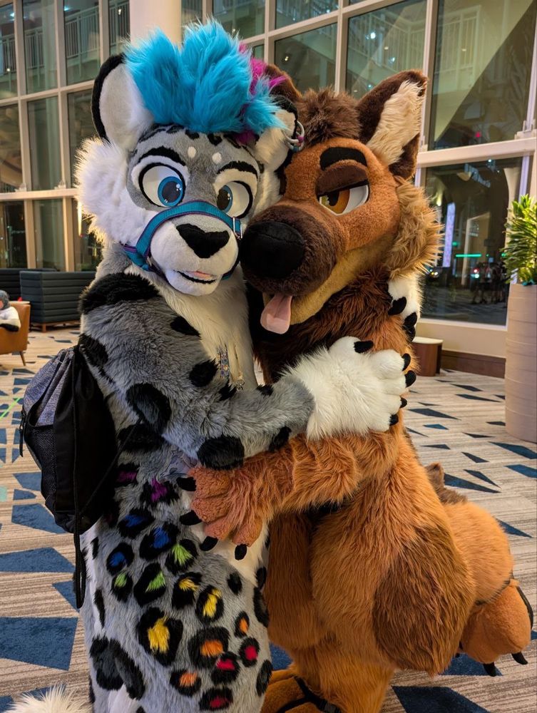 Silver Snep and Trip Shep hugging it out after battling for Sheptember