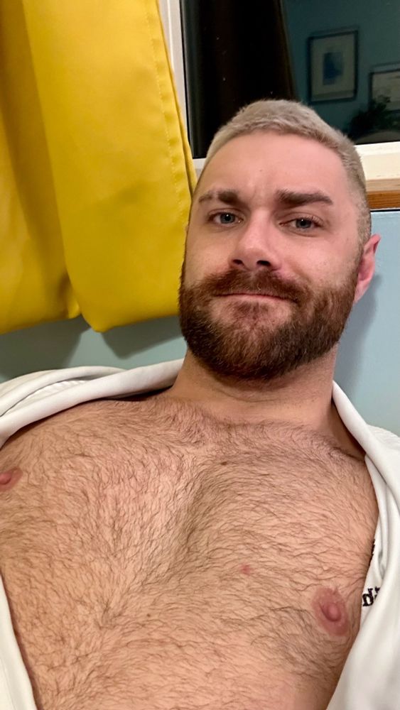 Hairy blond idiot with his tiddies out