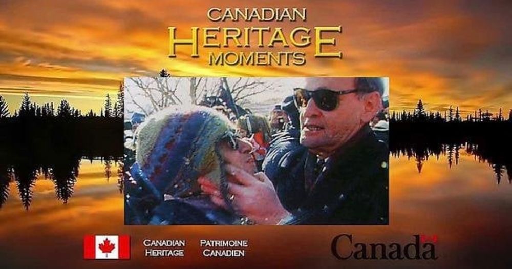 Former PM Jean Chretien demonstrates the Shawinigan Handshake for a protestor.