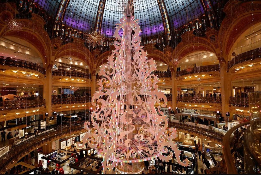 The original Christmas tree displayed inside the Galeries Lafayette department store in Paris. Photo by Grégoire CAMPIONEAFP via Getty Images