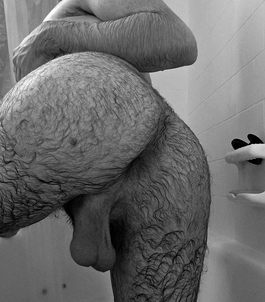 Hairy enby kneeling in the shower showing off my hairy ass and hanging balls