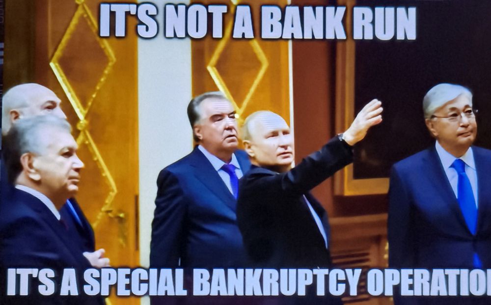 Image with Putin standing and pointing like he is trying to explain something to some other  people. The text "IT'S NOT A BANK RUN, IT'S A SPECIAL BANKRUPTSY OPERATION" is shown on the picture. 