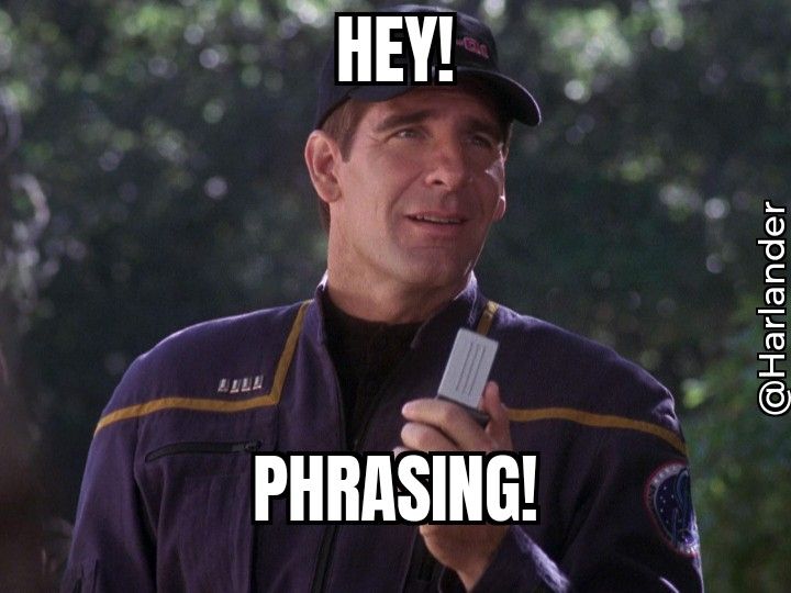 Captain Jonathan Archer from Star Trek: Enterprise holds a communicator up. The caption reads, 