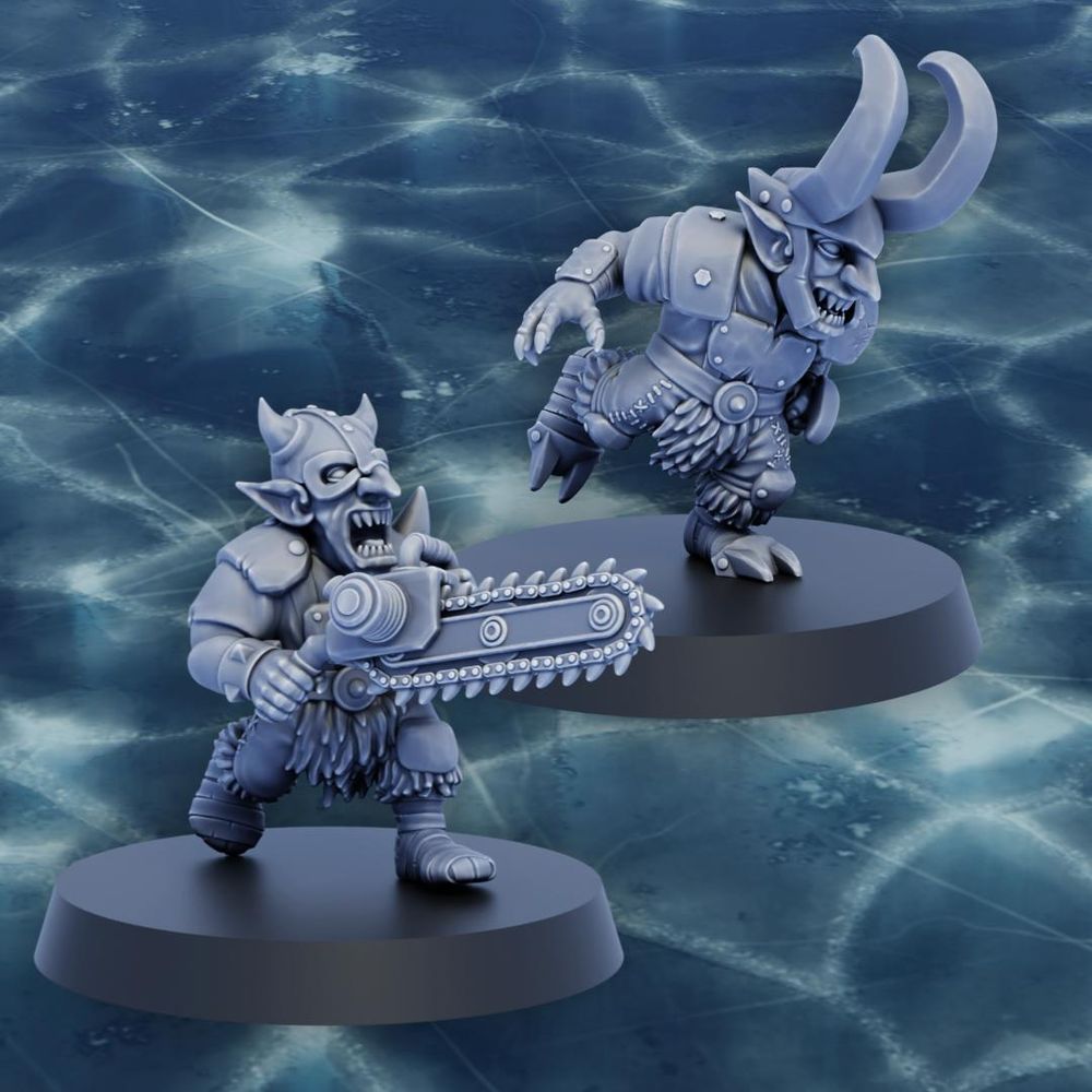 a render of two goblin miniatures in grey, one is wielding a chainsaw the other is wearing a helmet with Loki style horns