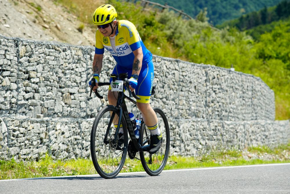 Federico cycling the final part of the "passo del Giogo" final climb of the Gran Fondo del Mugello medium route