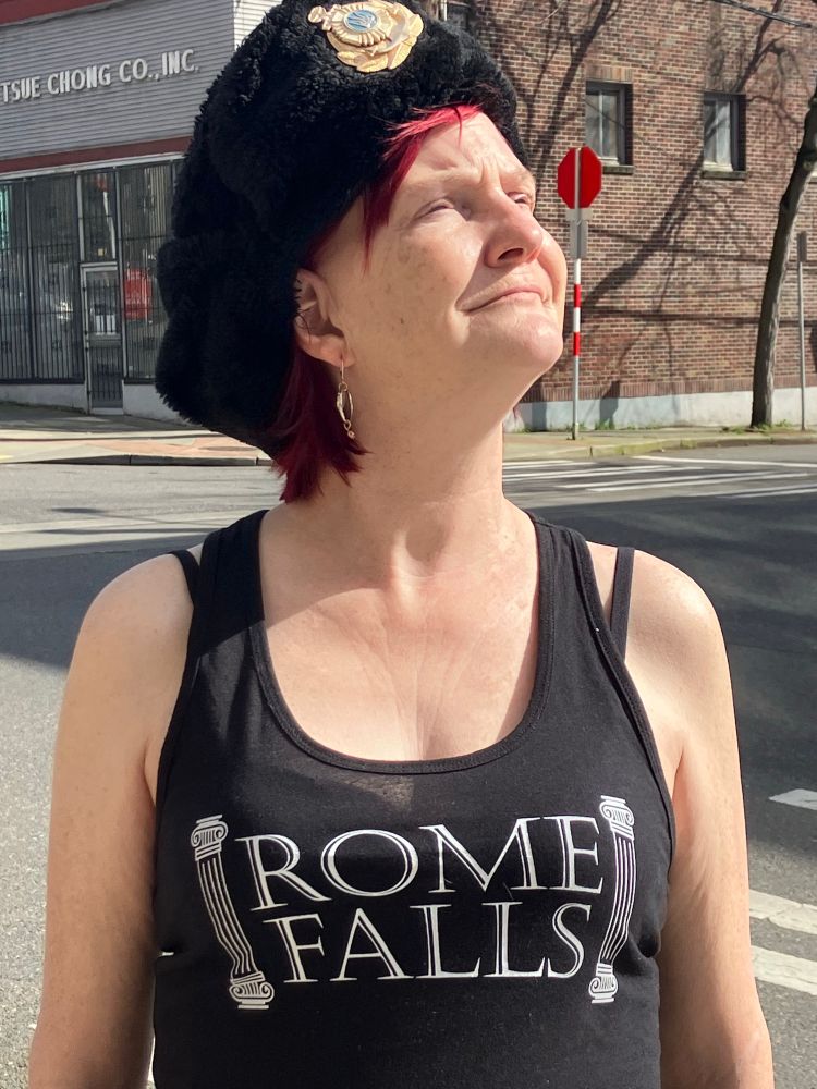 Dudette in a Left Wing Propaganda political shirt! “Rome Falls”