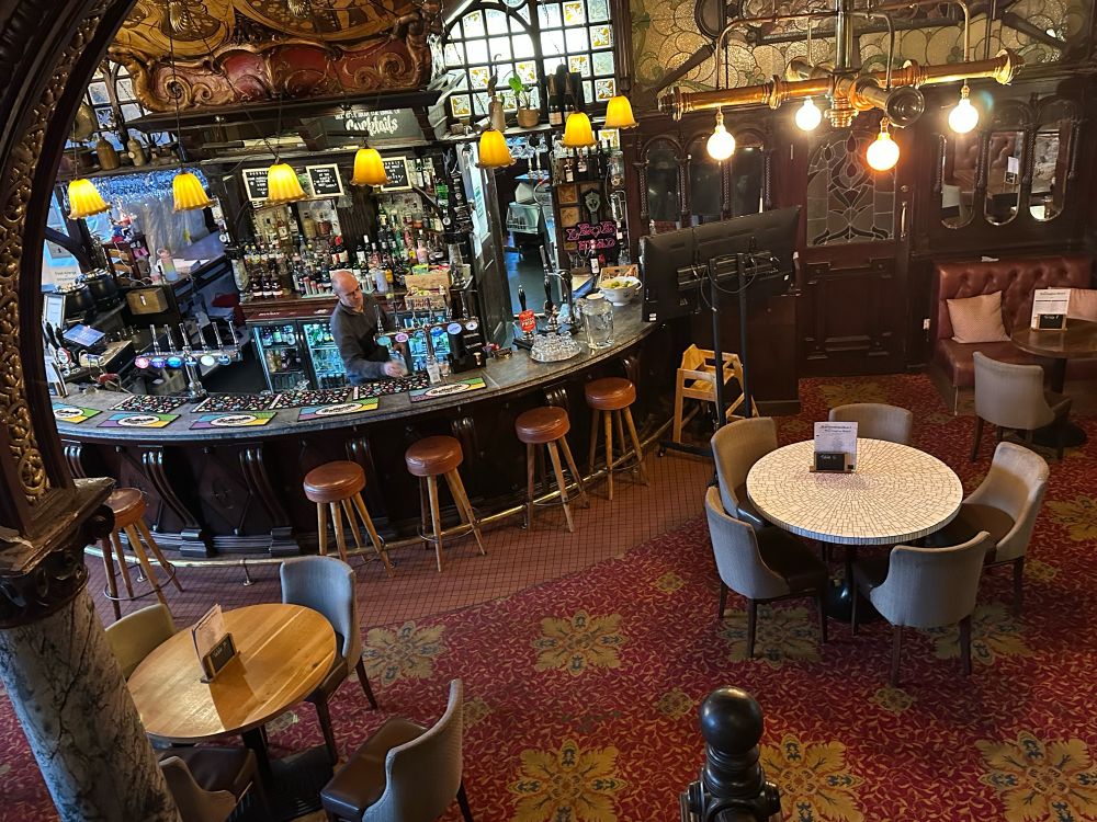 An overhead view (from the staircase) of the bar in the Warrington Hotel.